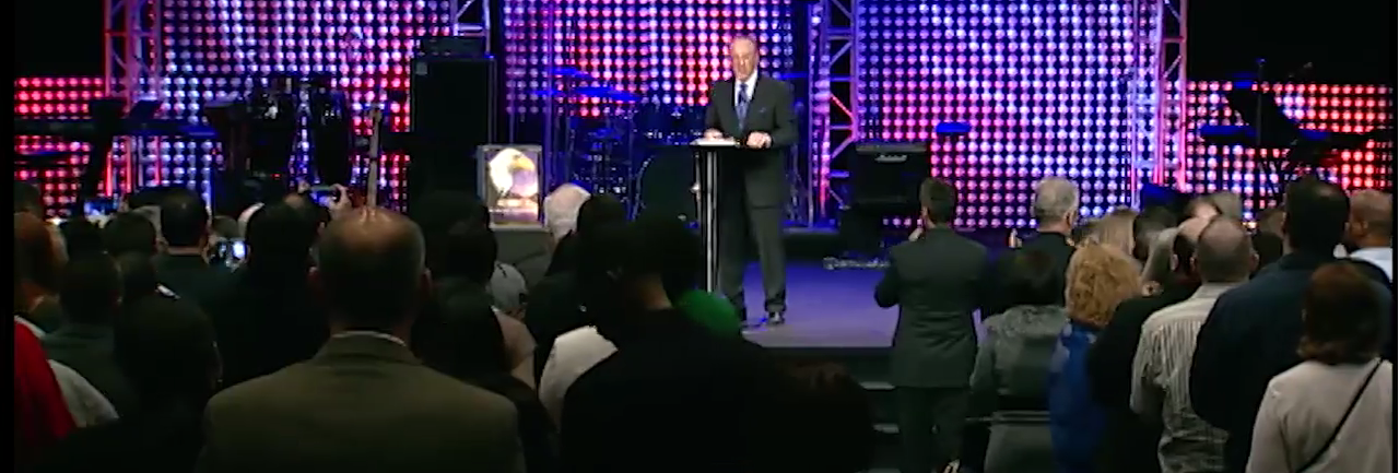 Dr. Peter J. Daniels receiving a standing ovation